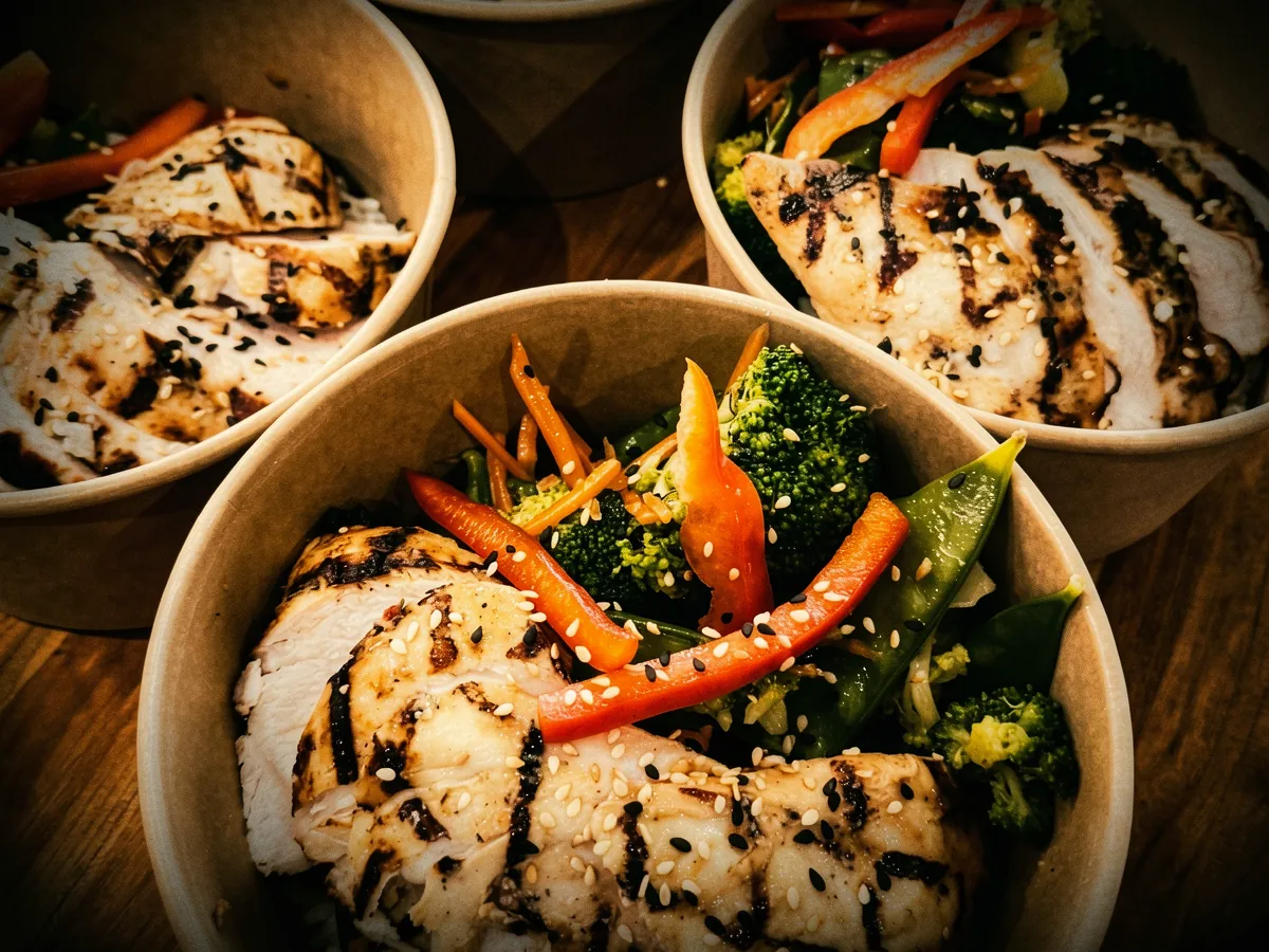 Grilled chicken rice bowls portioned to order