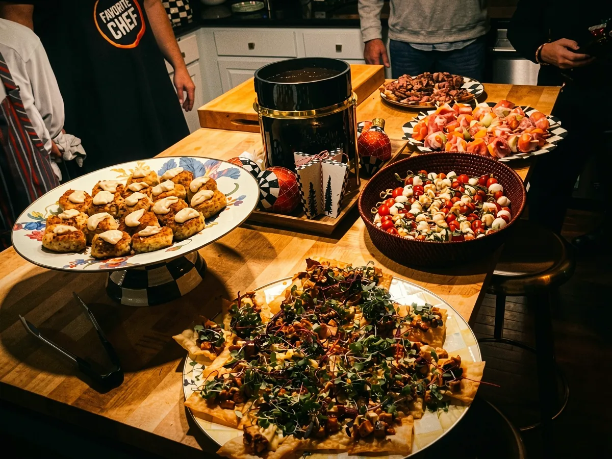 Chef T hosting a private event with a full spread