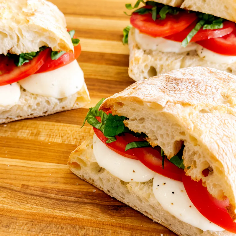 Caprese ciabatta sandwiches with fresh mozzarella, tomato and basil