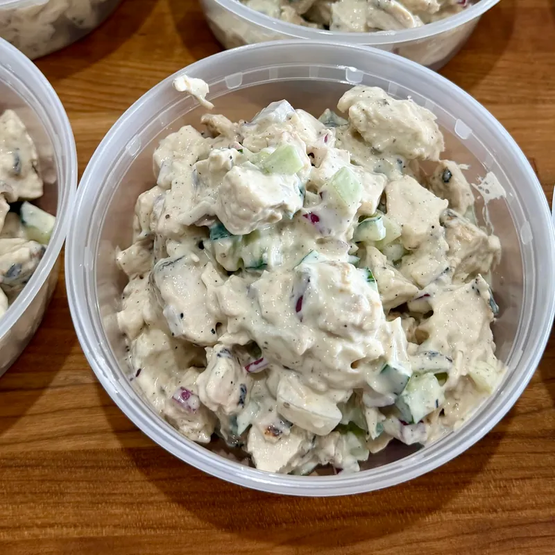 Chunky chicken salad portioned into grab-and-go cups